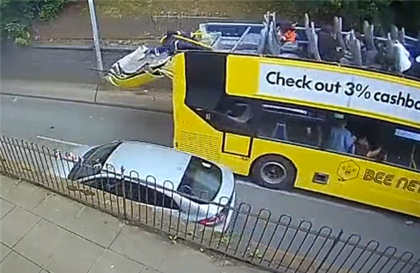 Double-decker bus sustains 'headline' damage after hitting bridge in the UK: 15 injured