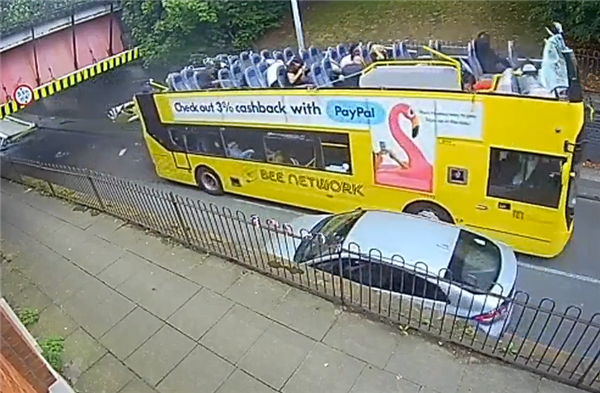 Double-decker bus sustains 'headline' damage after hitting bridge in the UK: 15 injured