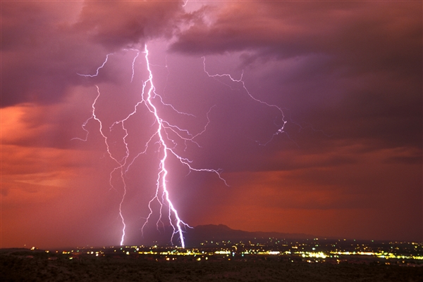 Woman Captures Unidentified Shadow While Filming Lightning: A First-Hand Experience